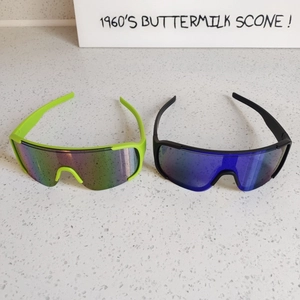 Polarized sports sunglasses set with fluorescent green and black frames for cycling