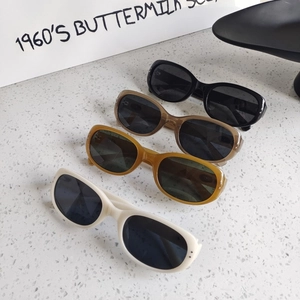 Retro oval sunglasses in black, tea, ginger, and cream white with UV protection lenses