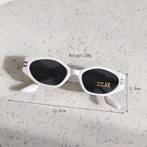 Detailed view of white frame kids sunglasses with UV400 gold accents and size dimensions