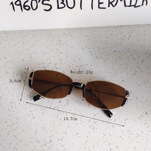Detail view of vintage cat-eye sunglasses with dimensions 14.7cm width and 23g weight