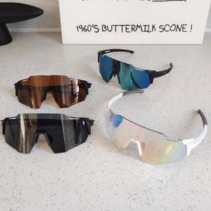 Outdoor cycling sunglasses for men and women featuring wrap-around lenses in four colors