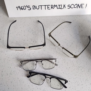 Unisex retro semi-rimless anti-blue light glasses in black, tea, and gray frames