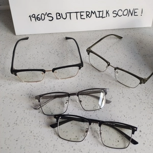 Detailed view of four semi-rimless clubmaster glasses frames in multiple colors