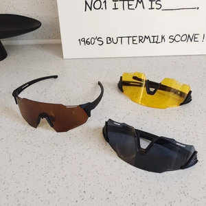 Three interchangeable lens set in brown, yellow, and grey for outdoor cycling sunglasses