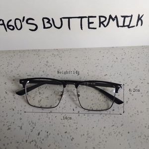 Detail view of lightweight 14g black semi-rimless glasses with dimensions and frame specs