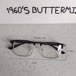 Detail of half-frame glasses weighing 14g with 14cm width and 4.2cm frame height
