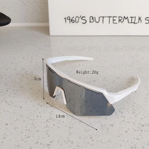 Detailed view of white oversized kids cycling sunglasses showing 14cm width and 5cm height