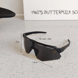 Detail of lightweight black sports sunglasses with dimensions 14cm width and 5cm height