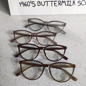 Vintage cat eye anti-blue light glasses in grey, pink, brown, and olive green frames