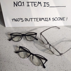 Retro cat-eye blue light blocking glasses in black and transparent grey frames