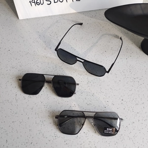 Close-up of polarized photochromic sunglasses with metal frames for driving and fishing