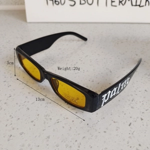 Detail view of retro rectangle kids sunglasses with Palm logo and size measurements
