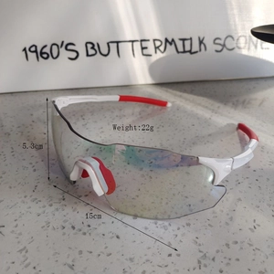 Detail shot of white and red sports glasses showing dimensions 15cm width and 22g weight
