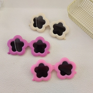 Kids cute flower shaped sunglasses in cream white, rose red and light pink colors