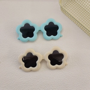 Toddler flower-shaped sunglasses in light blue and cream white colors for girls and boys