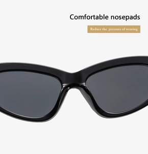 Close-up of comfortable integrated nose pads on black wide-frame stylish sunglasses