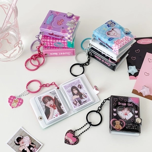 Mini heart cutout photo album keychain for photocard storage in multiple colors