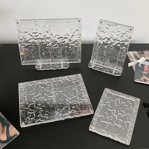 Close-up of clear acrylic photo frame with water ripple texture and magnetic closure