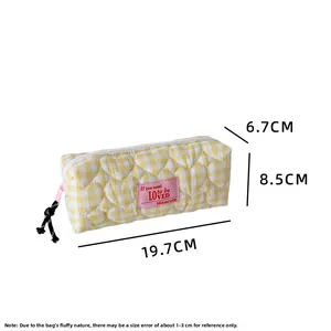 Quilted heart pouch dimensions showing 19.7x8.5x6.7cm for stationery or makeup