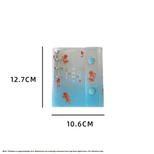 Detailed dimensions of the light blue PVC mini binder with koi patterns and sizing data