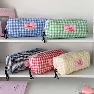 Quilted plaid pencil cases in five colors with heart stitching and woven pull strings