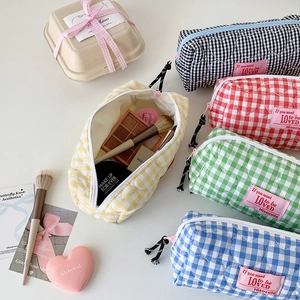 Quilted heart patterned checkered pencil cases in five colors with top zipper closure