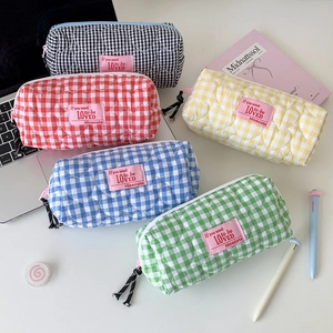 Quilted checkerboard pencil pouches in five colors with heart pattern and zipper