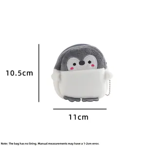 Detail of cartoon penguin plush coin purse with size markings of 10.5cm and 11cm