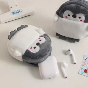 Cute plush penguin pouch for wireless earbuds and coins with soft embroidery detail