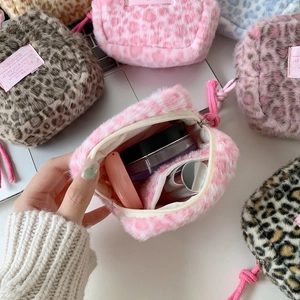 Soft leopard print plush makeup bag set with zip closure and Hisocute brand tag
