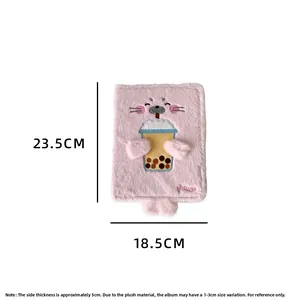Detail view of pink plush photo album cover showing cute seal embroidery and dimensions