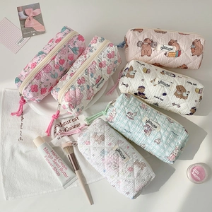 Quilted floral pencil cases and cosmetic bags with cute animal prints and zipper closure