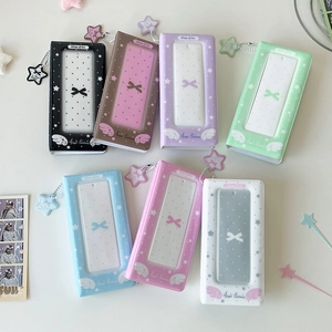 Star-themed four-grid photo album with star charm for idol photocards and ticket storage