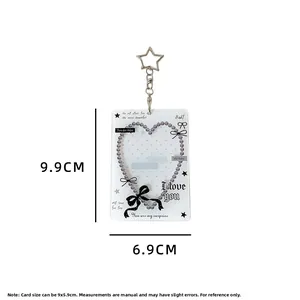 Detailed dimensions of the hollow heart card holder with star keychain and bow