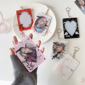 Cute bow acrylic photocard holder with star keychain and pearl border for K-pop fans