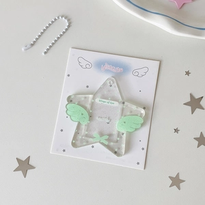 Glittering star-shaped acrylic card holder with light green wings and bead chain