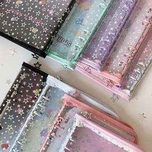 Detailed view of colorful A5 star laser binders with 6-ring binders and star zipper sliders
