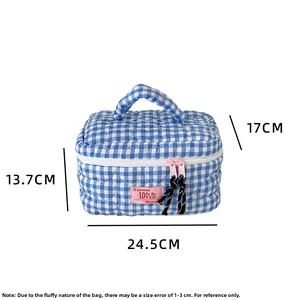 Blue and white plaid quilted cosmetic bag with dimensions 24.5cm x 13.7cm x 17cm