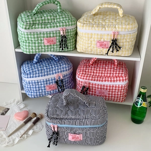 Quilted plaid makeup bags with heart stitching and top handle in five vibrant colors