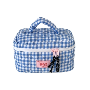 Quilted blue checkered cosmetic bag with heart pattern and pink zipper handle