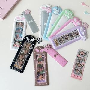 Detail of four-grid photo card holders with star pendants in various macaron colors