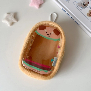 Macro shot of 10cm plush doll storage bag with transparent window and cute dog print