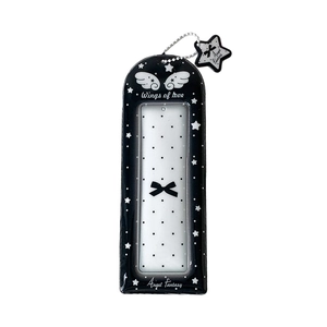 Black photocard holder with angel wings design and star charm on a clean white background