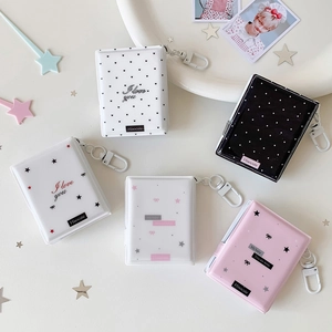 Close-up of 2-inch mini photo albums with heart patterns and hanging clips for ID photos