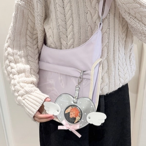 Purple canvas crossbody ita bag with clear window and winged heart badge holder