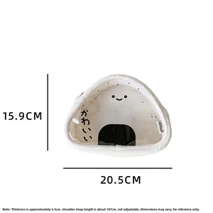 Detail view of the white plush triangular crossbody bag with clear window and dimensions