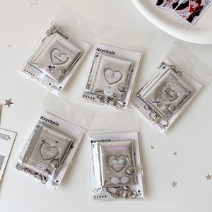Mini heart cutout photo album keychain set with silver mirror finish and metal lobster clasp