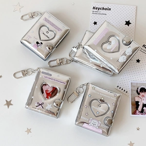 Silver 2-inch mini photo album keychain with heart cutout and metal clasp for photocards