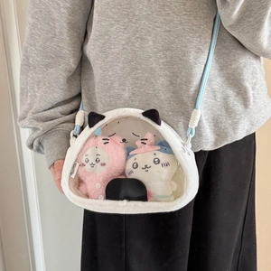 White plush kitten crossbody bag with clear window showing two cute cartoon dolls inside