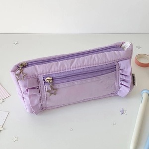 Detail of lavender pleated pencil case with star zipper pull and large capacity storage